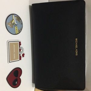 Michael Kors Black large sticker wristlet, NWT